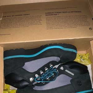 Blue, black, and gray timberland boots.